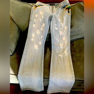 Roberto Cavalli distressed light jeans with jewel detail, flare leg, long inseam
